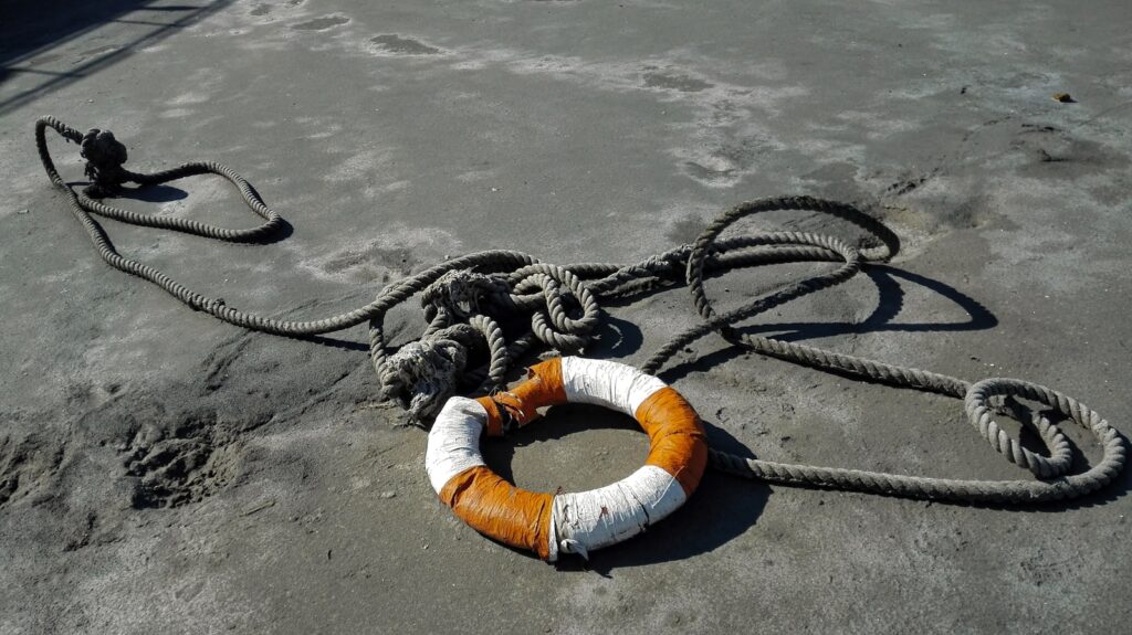 a person lying on the sand