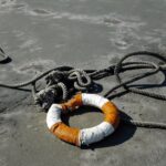 a person lying on the sand